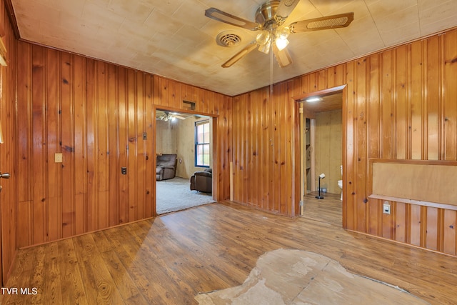 1275 Chuckey Pike, Chuckey, TN 37641 - unfurnished room with wood finished floors, a ceiling fan, and wood walls