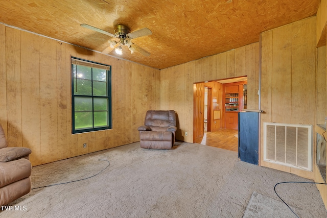 1275 Chuckey Pike, Chuckey, TN 37641 - unfurnished room featuring ceiling fan, wooden walls, and carpet