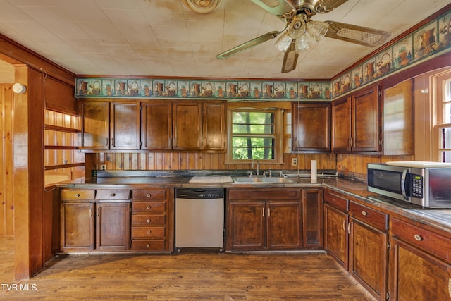 1275 Chuckey Pike, Chuckey, TN 37641 - kitchen featuring appliances with stainless steel finishes, a sink, dark wood finished floors, a ceiling fan, and stainless steel countertops