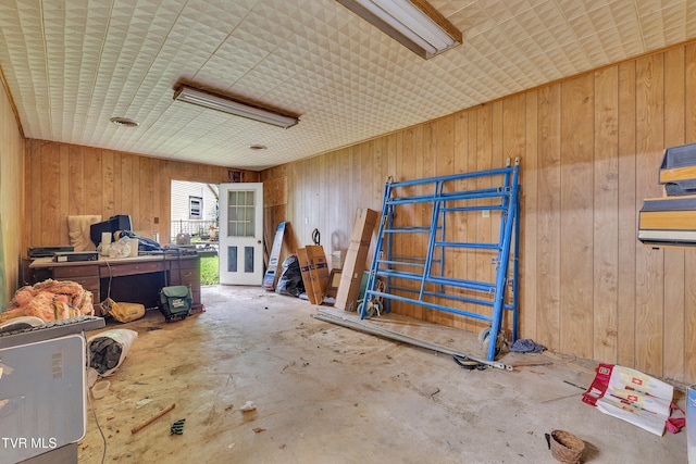 1275 Chuckey Pike, Chuckey, TN 37641 - miscellaneous room featuring wood walls and concrete flooring