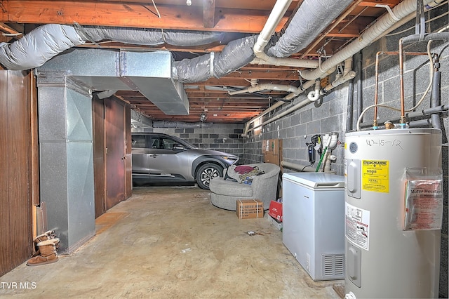 205 Live Oak Dr, Kingsport, TN 37660 - unfinished below grade area featuring water heater, concrete block wall, and washer / clothes dryer