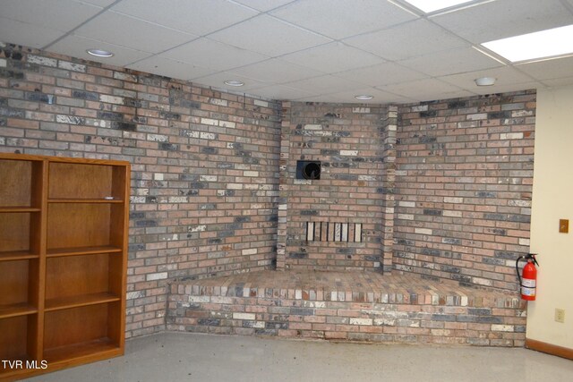 290 Kinchloe Mill Rd, Jonesborough, TN 37659 - basement with a paneled ceiling, recessed lighting, baseboards, and brick wall