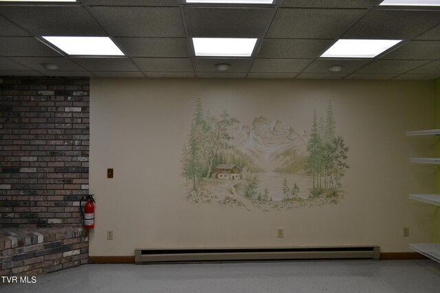 290 Kinchloe Mill Rd, Jonesborough, TN 37659 - unfurnished room with a baseboard radiator, baseboards, and a paneled ceiling