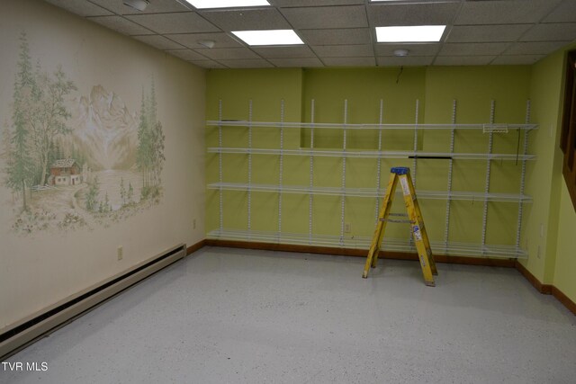 290 Kinchloe Mill Rd, Jonesborough, TN 37659 - empty room featuring a baseboard radiator, baseboards, and a paneled ceiling