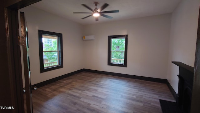 616 6th St, Bristol, TN 37620 - unfurnished room featuring healthy amount of natural light, a ceiling fan, wood finished floors, and baseboards