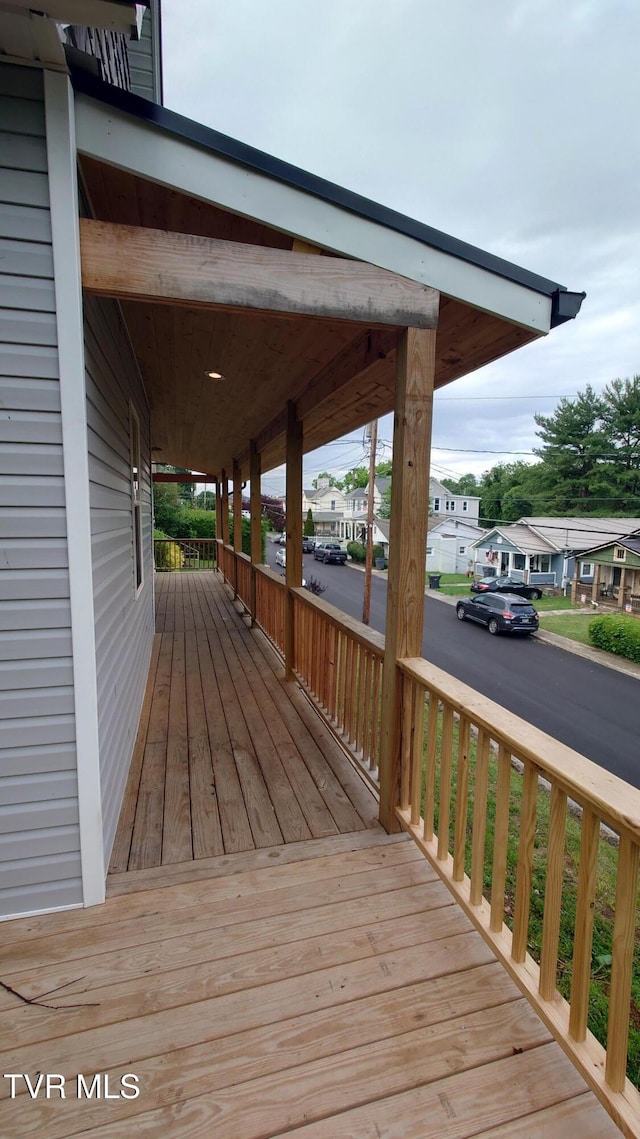 616 6th St, Bristol, TN 37620 - wooden porch with a residential view