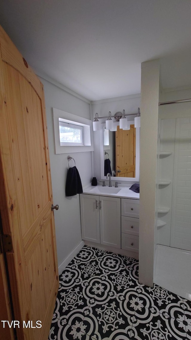 616 6th St, Bristol, TN 37620 - bathroom featuring vanity and a shower