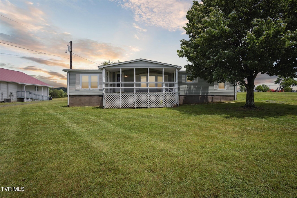 222 Massengill Pl, Bluff City, TN 37618 - back of property with crawl space and a yard