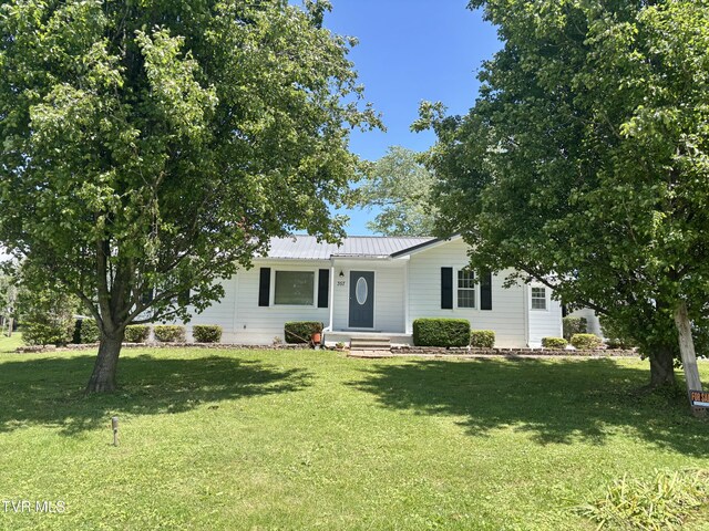 357 Martin St, Jonesville, VA 24263 - ranch-style house featuring a front lawn and metal roof