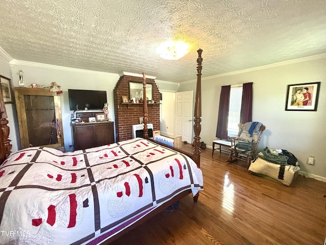 357 Martin St, Jonesville, VA 24263 - bedroom with hardwood / wood-style flooring, a textured ceiling, crown molding, and baseboards