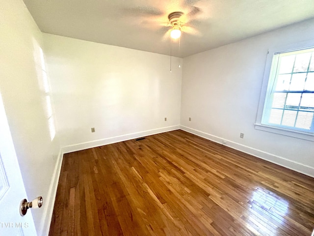 357 Martin St, Jonesville, VA 24263 - unfurnished room with wood finished floors, a ceiling fan, and baseboards