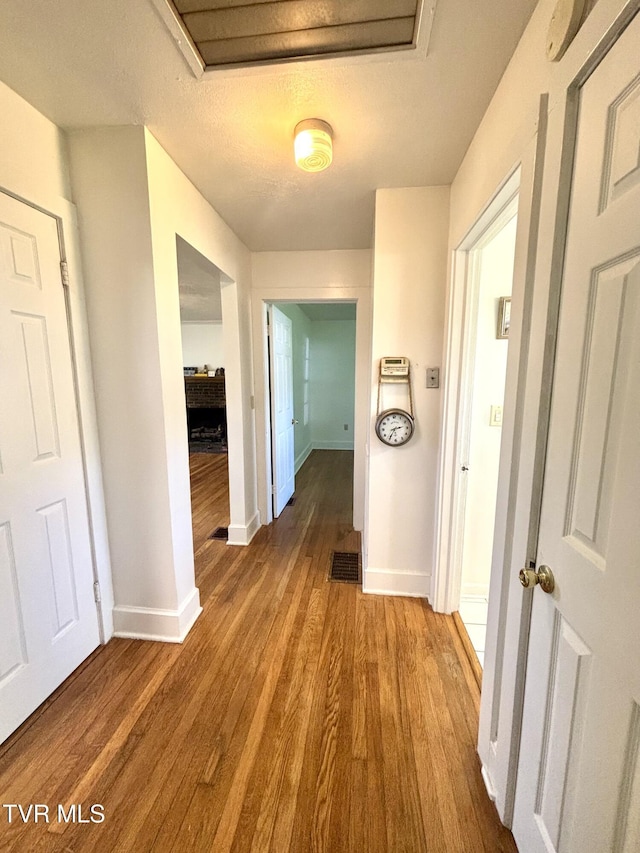 357 Martin St, Jonesville, VA 24263 - hallway featuring baseboards and wood finished floors