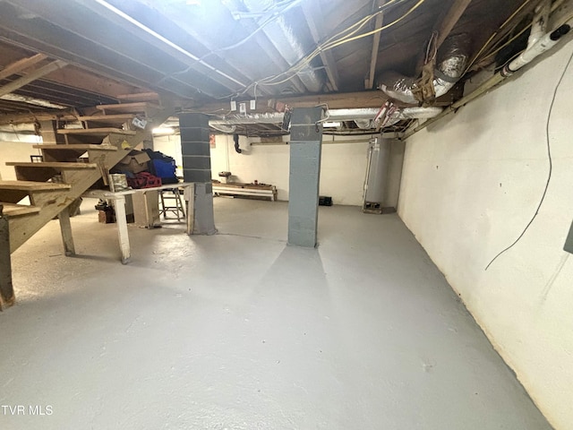 357 Martin St, Jonesville, VA 24263 - unfinished basement featuring stairway and gas water heater