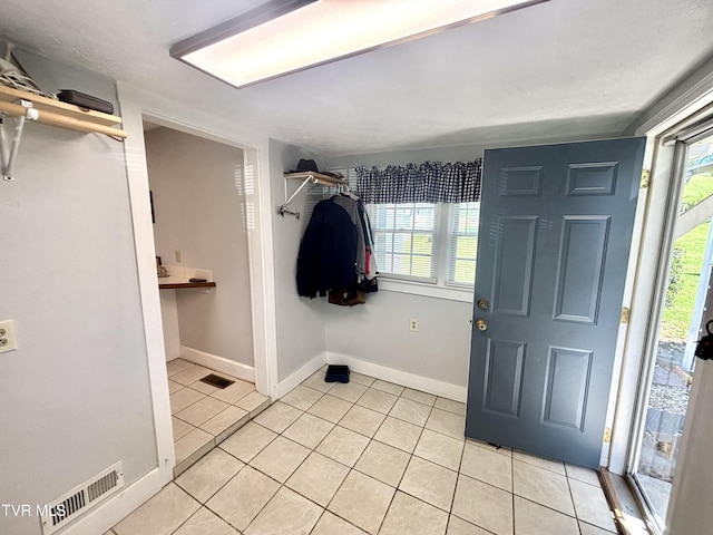 357 Martin St, Jonesville, VA 24263 - interior space featuring light tile patterned floors, healthy amount of natural light, and baseboards