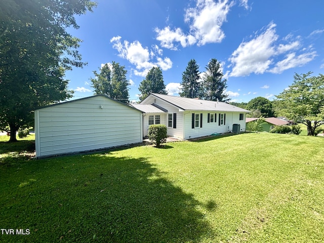 357 Martin St, Jonesville, VA 24263 - back of house featuring a lawn and metal roof