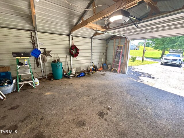 357 Martin St, Jonesville, VA 24263 - garage with a garage door opener and metal wall