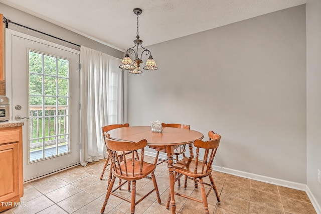 220 Amanda Ln Unit 2, Bristol, TN 37620 - dining area with plenty of natural light, a chandelier, and baseboards
