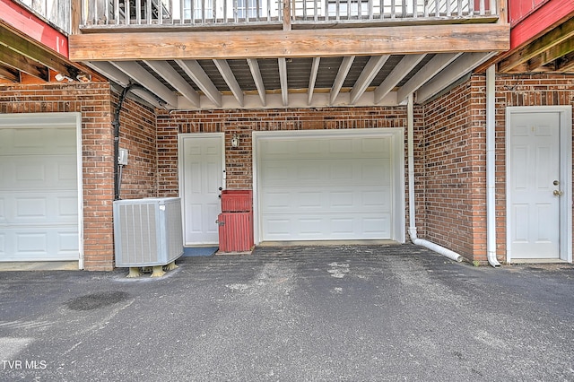 220 Amanda Ln Unit 2, Bristol, TN 37620 - garage featuring cooling unit and asphalt driveway