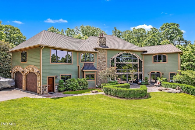 18549 Landridge Way, Abingdon, VA 24211 - view of front facade featuring an attached garage, a standing seam roof, a front lawn, metal roof, and stone siding