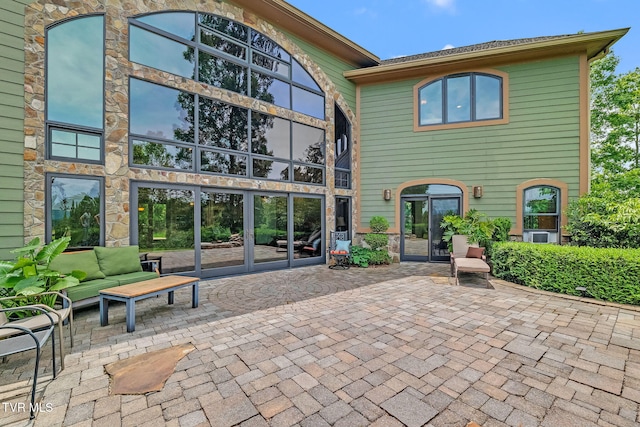 18549 Landridge Way, Abingdon, VA 24211 - rear view of property featuring a patio area and outdoor lounge area