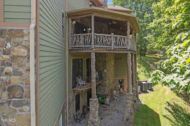 18549 Landridge Way, Abingdon, VA 24211 - view of side of home with a balcony, stone siding, a ceiling fan, and central AC