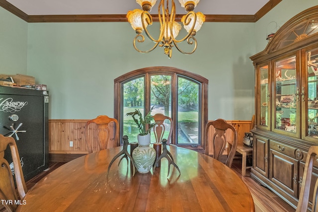 18549 Landridge Way, Abingdon, VA 24211 - dining area featuring crown molding, a wainscoted wall, a chandelier, wood finished floors, and wooden walls