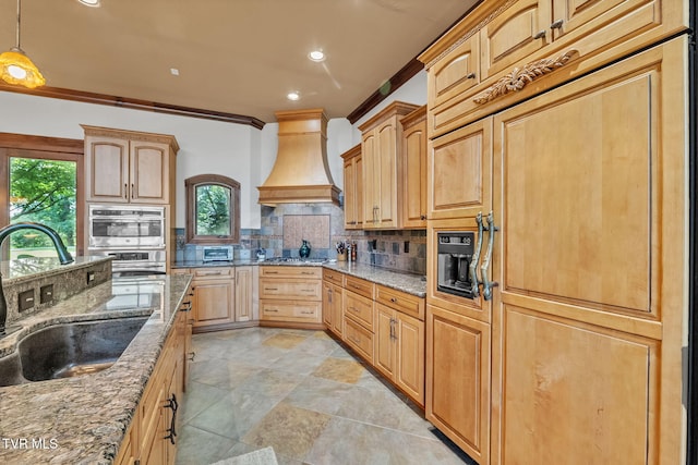 18549 Landridge Way, Abingdon, VA 24211 - kitchen with a sink, custom range hood, light stone counters, decorative backsplash, and plenty of natural light