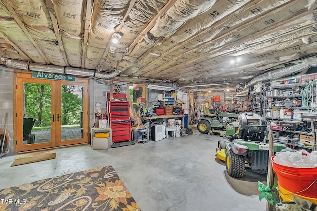 18549 Landridge Way, Abingdon, VA 24211 - garage with french doors and a workshop area