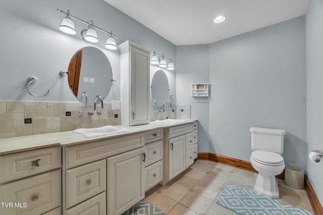 18549 Landridge Way, Abingdon, VA 24211 - full bathroom with double vanity, toilet, baseboards, and backsplash