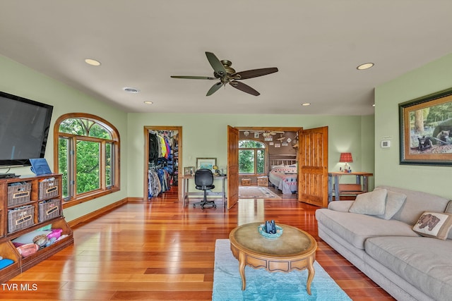 18549 Landridge Way, Abingdon, VA 24211 - living room featuring wood finished floors, healthy amount of natural light, ceiling fan, recessed lighting, and baseboards