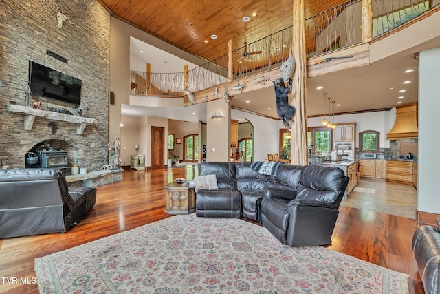 18549 Landridge Way, Abingdon, VA 24211 - living area featuring a towering ceiling, arched walkways, light wood-style flooring, wood ceiling, and recessed lighting