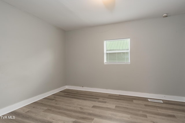 1605 E Fairview Ave, Johnson City, TN 37601 - spare room with wood finished floors and baseboards