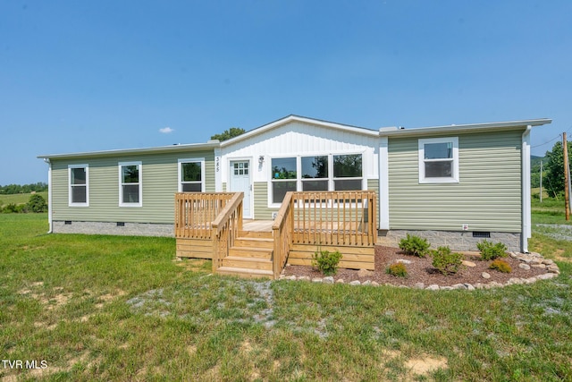 385 Piney Grove Rd, Greeneville, TN 37743 - back of property with crawl space, a deck, and a lawn