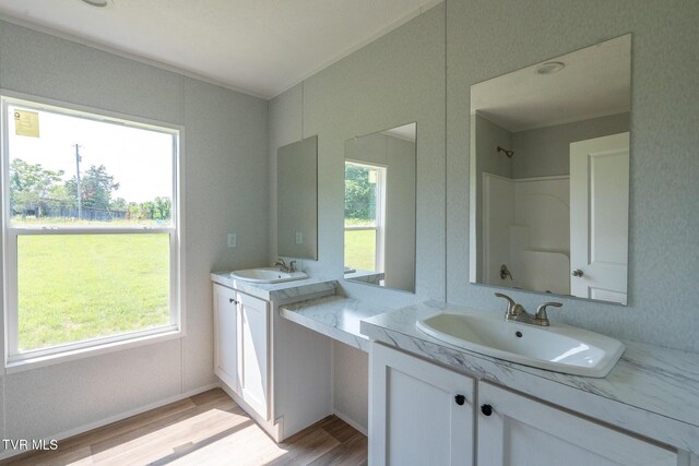 385 Piney Grove Rd, Greeneville, TN 37743 - full bath featuring two vanities and wood finished floors
