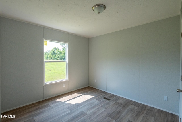 385 Piney Grove Rd, Greeneville, TN 37743 - spare room with wood finished floors and baseboards