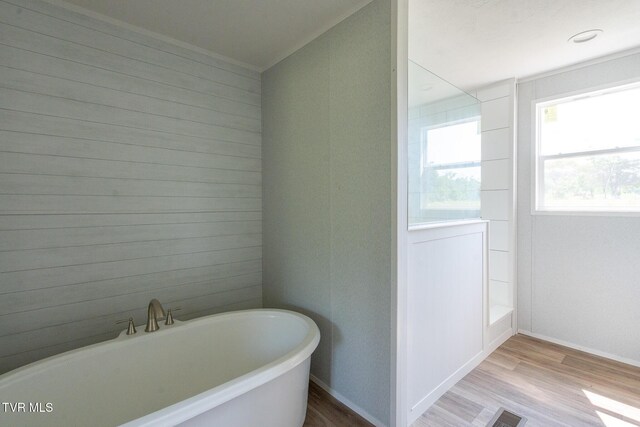 385 Piney Grove Rd, Greeneville, TN 37743 - full bath featuring a soaking tub, wood finished floors, and baseboards