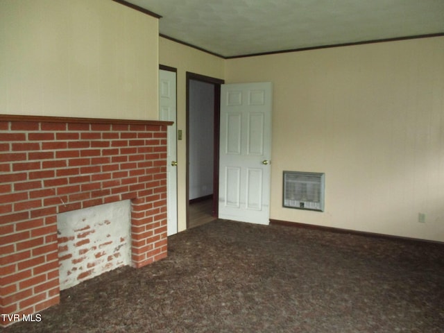 19374 Benhams Rd, Bristol, VA 24202 - unfurnished room featuring ornamental molding, carpet, heating unit, and a brick fireplace