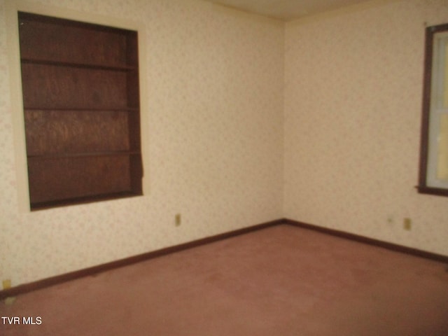 19374 Benhams Rd, Bristol, VA 24202 - carpeted spare room featuring wallpapered walls and baseboards