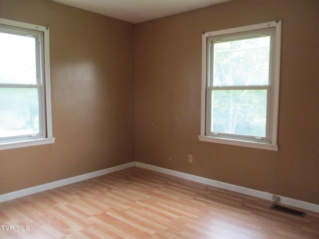 19374 Benhams Rd, Bristol, VA 24202 - spare room featuring light wood-style flooring and baseboards