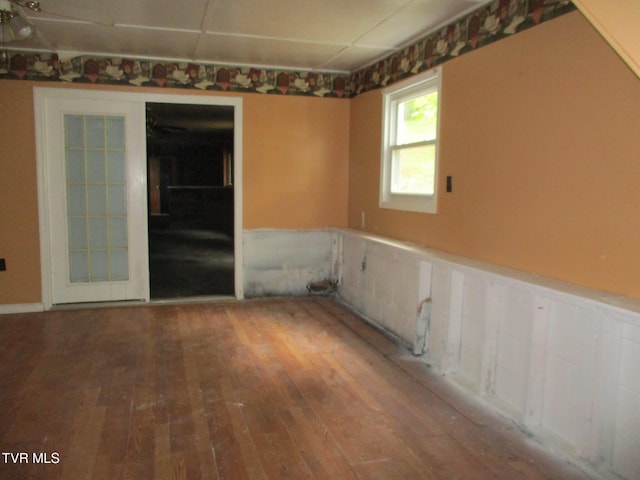 19374 Benhams Rd, Bristol, VA 24202 - unfurnished room with hardwood / wood-style flooring and a wainscoted wall