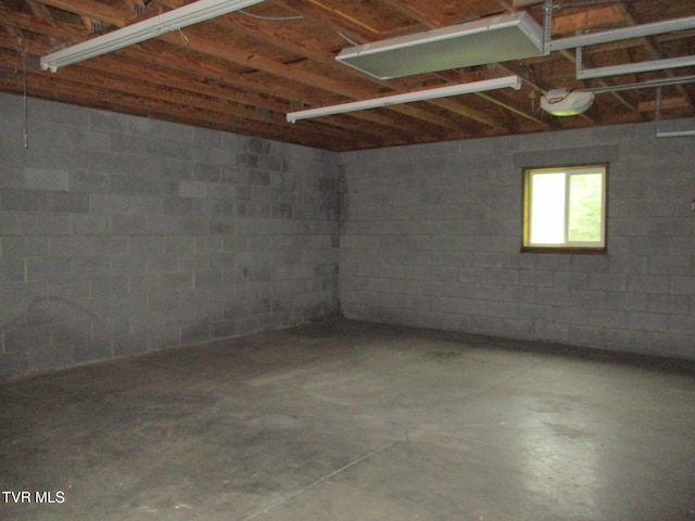 19374 Benhams Rd, Bristol, VA 24202 - below grade area with concrete block wall and a garage