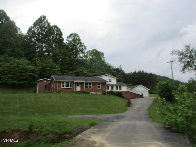 19374 Benhams Rd, Bristol, VA 24202 - ranch-style house featuring an outdoor structure, a garage, and a front lawn