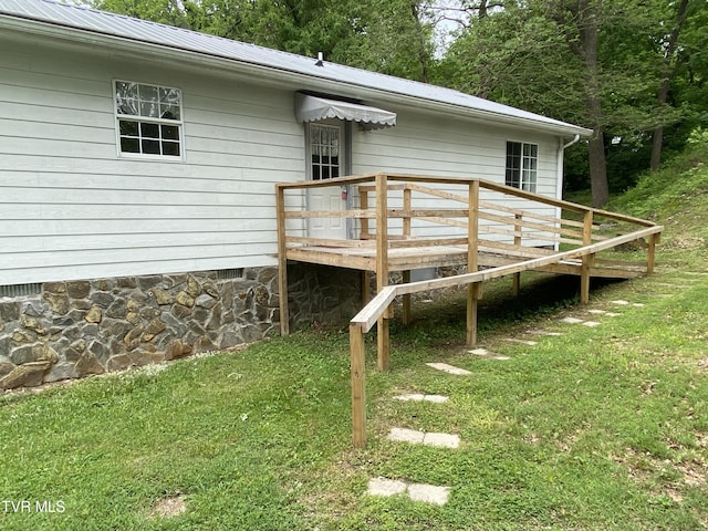 202 Locust St, Greeneville, TN 37745 - rear view of property with a deck, metal roof, and a yard