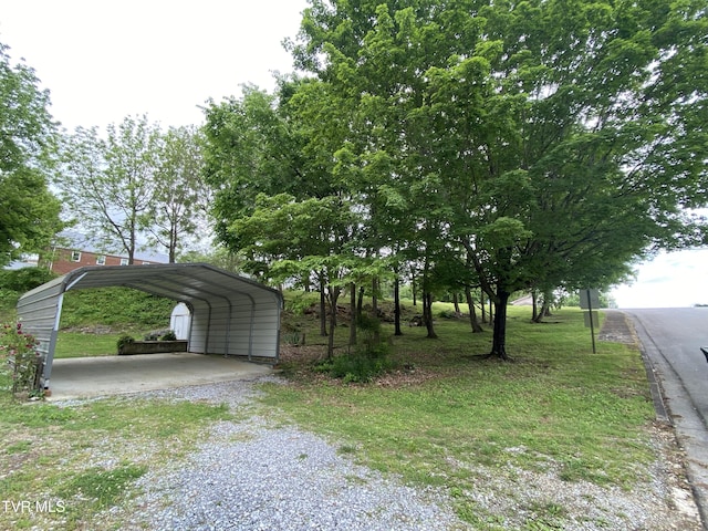 202 Locust St, Greeneville, TN 37745 - exterior space with driveway and a detached carport