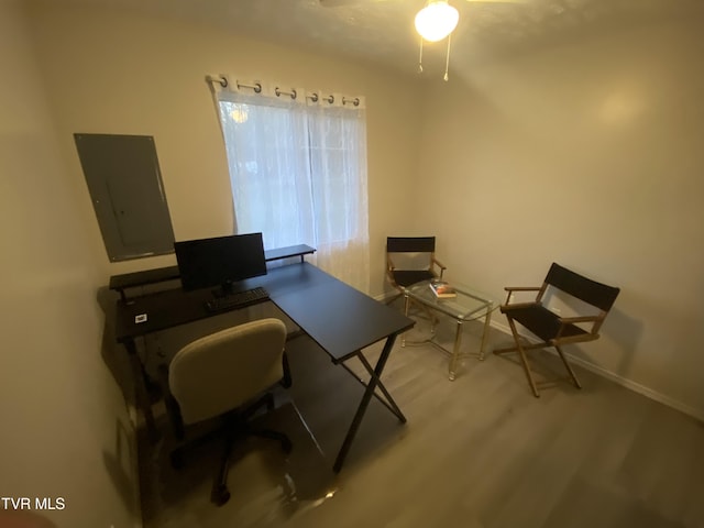 202 Locust St, Greeneville, TN 37745 - office with electric panel, a ceiling fan, light wood-type flooring, and baseboards