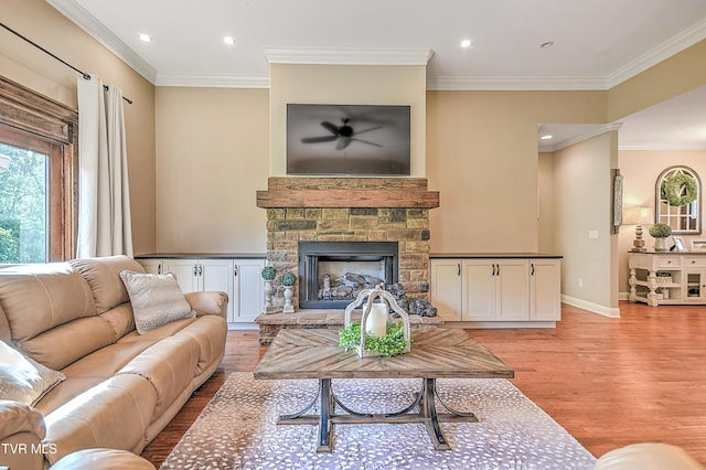 133 Christopher Way, Blountville, TN 37617 - living room featuring light wood-style flooring, ornamental molding, recessed lighting, a ceiling fan, and a fireplace