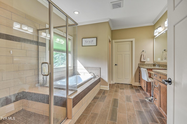 133 Christopher Way, Blountville, TN 37617 - bathroom featuring double vanity, a bath, ornamental molding, a stall shower, and wood finished floors