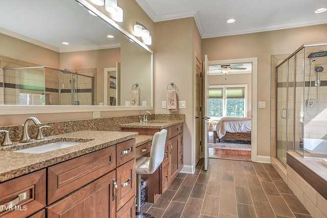 133 Christopher Way, Blountville, TN 37617 - full bathroom with double vanity, a shower stall, a ceiling fan, crown molding, and ensuite bath