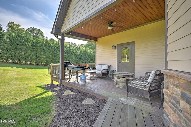 133 Christopher Way, Blountville, TN 37617 - wooden deck featuring a lawn, a ceiling fan, and an outdoor living space with a fire pit