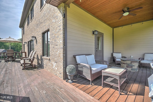 133 Christopher Way, Blountville, TN 37617 - wooden deck with a ceiling fan and an outdoor living space with a fire pit